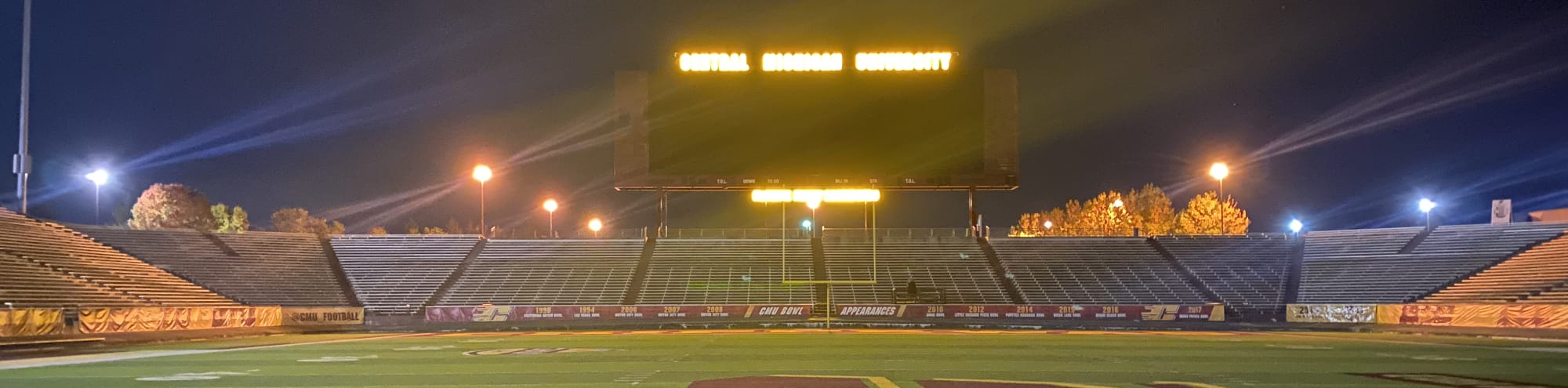 empty football stadium at night under the lights Augusta